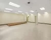 Empty room with a drop ceiling