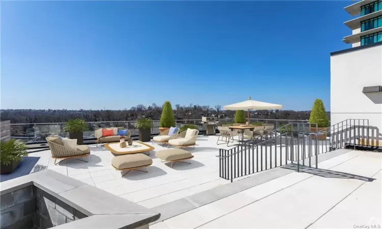 View of patio / terrace featuring an outdoor hangout area and a balcony