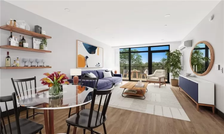 Dining room with floor to ceiling windows, hardwood / wood-style floors, and a wall mounted AC