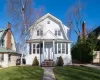 View of front facade featuring a front lawn