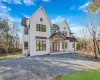 View of front of house with covered porch