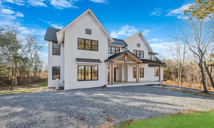 View of front of house with covered porch