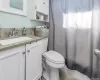 Bathroom with vanity and toilet