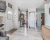 Entrance foyer with light hardwood / wood-style flooring