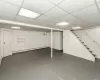 Unfurnished bedroom with baseboard heating, a closet, and light hardwood / wood-style flooring