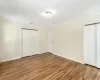 Kitchen with a chandelier, a healthy amount of sunlight, light wood-type flooring, and a baseboard heating unit