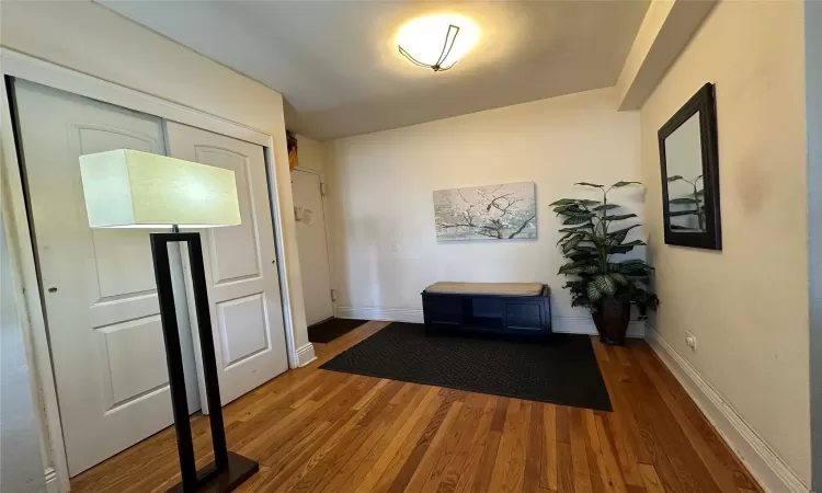 Corridor featuring hardwood / wood-style floors