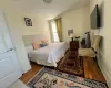 Bedroom featuring hardwood / wood-style floors