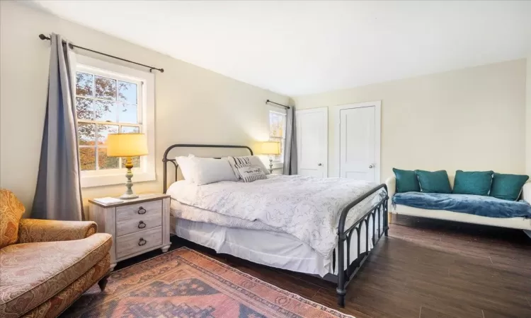 Bedroom featuring dark wood-type flooring