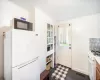 Entryway featuring dark tile patterned flooring