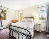 Bedroom featuring dark hardwood / wood-style floors