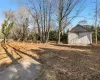 View of yard featuring an outdoor structure