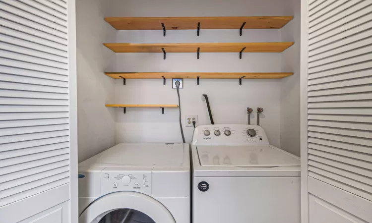 Washroom featuring separate washer and dryer