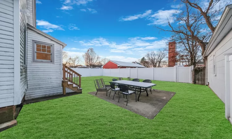 View of yard with a patio area