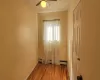 Spare room featuring ceiling fan and light hardwood / wood-style floors