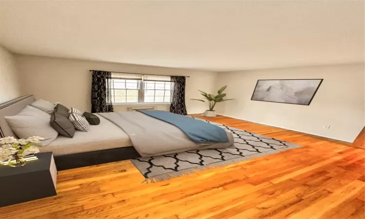 Virtually Staged Bedroom with wood-type flooring