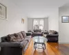 Living room featuring hardwood / wood-style flooring