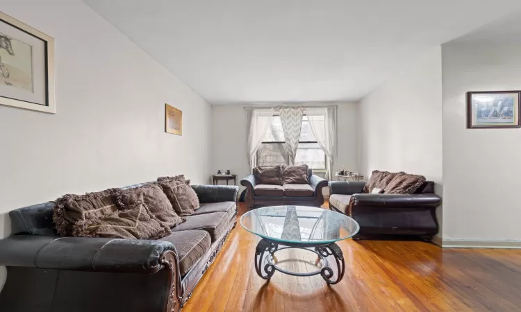 Living room featuring hardwood / wood-style flooring