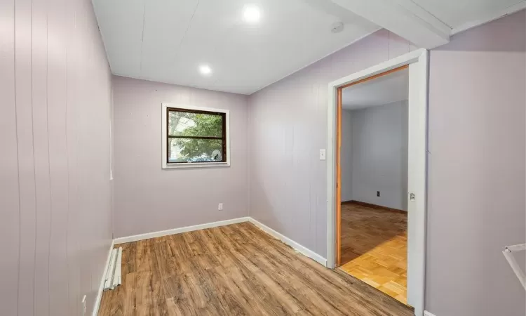 Empty room with parquet flooring