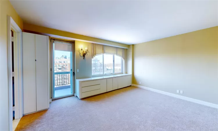 Primary Bedroom with Private Balcony, Master Bath, Walk-in Closet