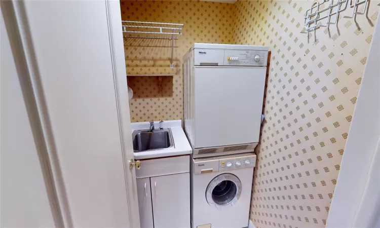 Located off Entry Hall Laundry Room with Large Utility Sink