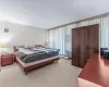 Bedroom with light carpet