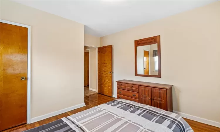 Bedroom featuring hardwood / wood-style floors