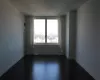 Living Room featuring dark hardwood / wood-style flooring and a wealth of natural light