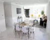 Dining area with ornamental molding