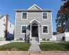 Front facade featuring a front lawn