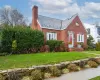 View of front of house with a front yard