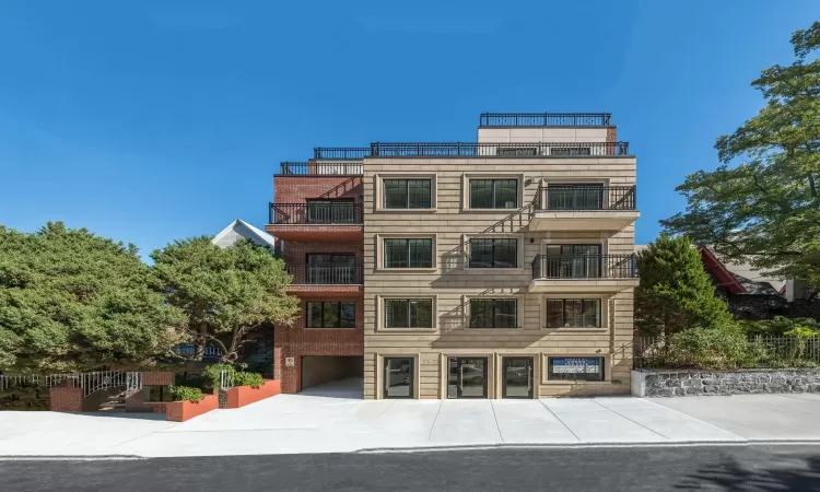 View of property with a garage