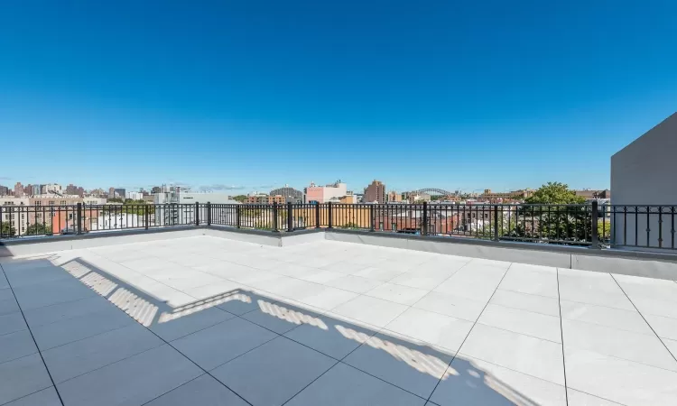 View of patio / terrace with a water view