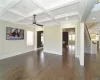 Spare room with beamed ceiling, ceiling fan, ornamental molding, and coffered ceiling. FOR MARKETING PURPOSES ONLY.