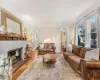 Living room featuring a fireplace and hardwood / wood-style flooring