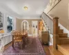 Dining space featuring dark wood-type flooring