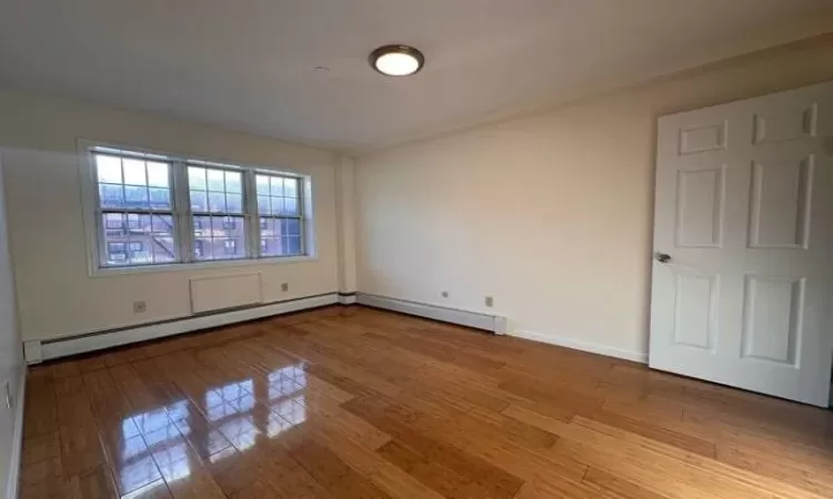 Empty room featuring light hardwood / wood-style floors