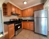 Kitchen with stainless steel appliances, tasteful backsplash, and sink