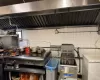 Kitchen area with grill and fryer...