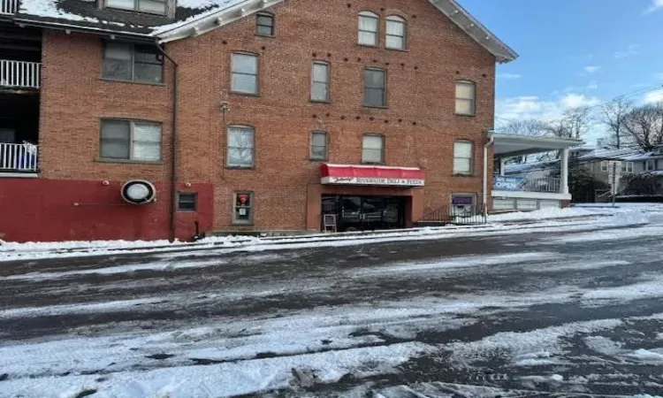 Entrance of the building and the parking area.