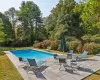 View of swimming pool with a patio area