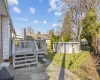 View of yard with a swimming pool side deck