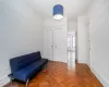 Sitting room with dark parquet flooring