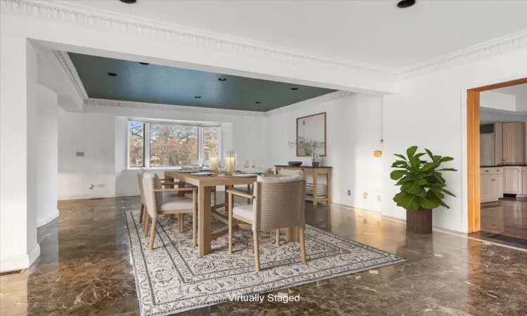 Dining room with ornamental molding