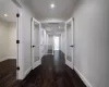 1st floor guest room with dark hardwood / wood-style flooring and ornamental molding