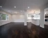 Dining room with crown molding and dark hardwood / wood-style flooring