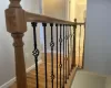 Staircase with hardwood / wood-style floors