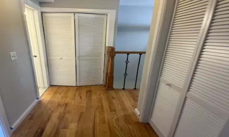 Corridor featuring light hardwood / wood-style floors