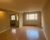 Living Room/Dining Rm Combination featuring light hardwood / wood-style floors and baseboard heating