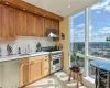 Kitchen featuring decorative backsplash, stainless steel appliances, and sink